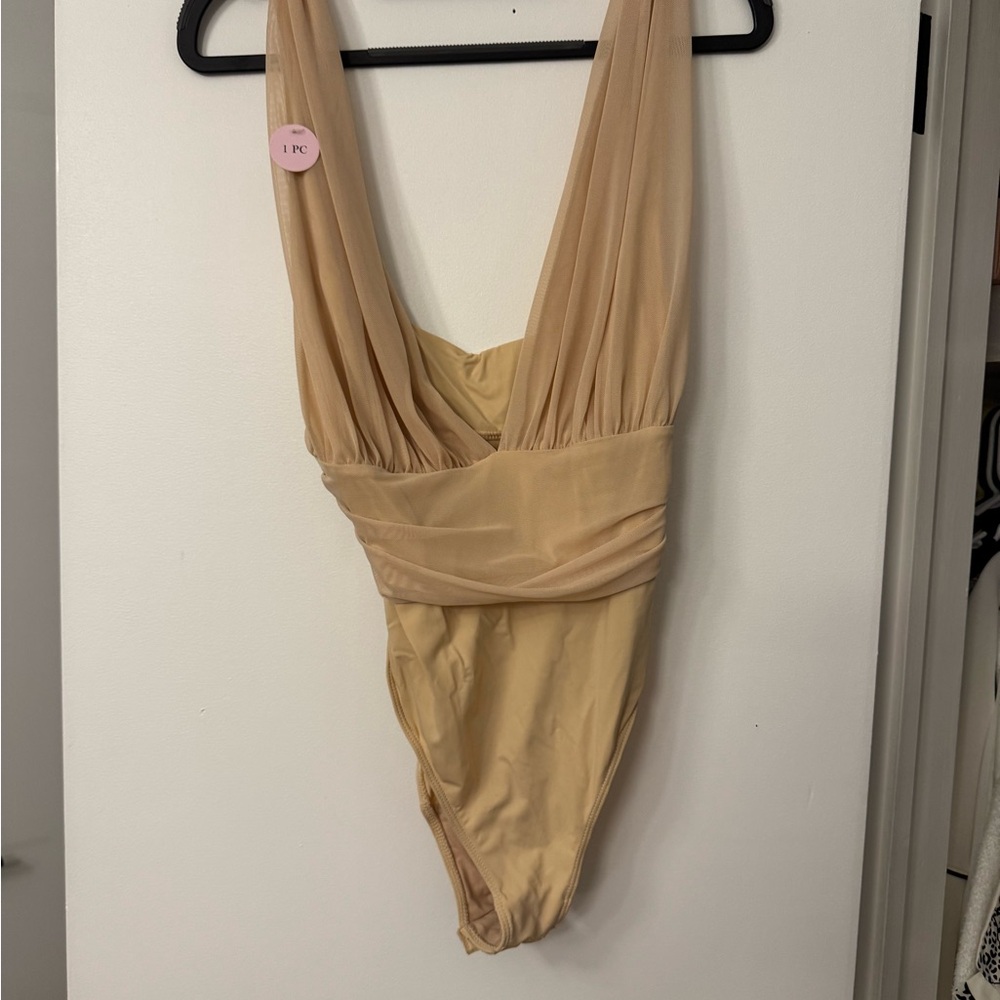 SOLD- Beige One Piece Bodysuit